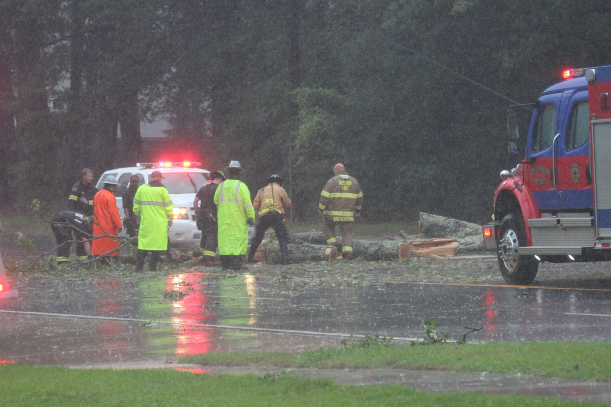 Emergency personnel broke out chain saws to remove this tree that blocked northbound lanes of North Trenton Street near Kentucky Avenue as Hurricane Laura roared across Ruston.