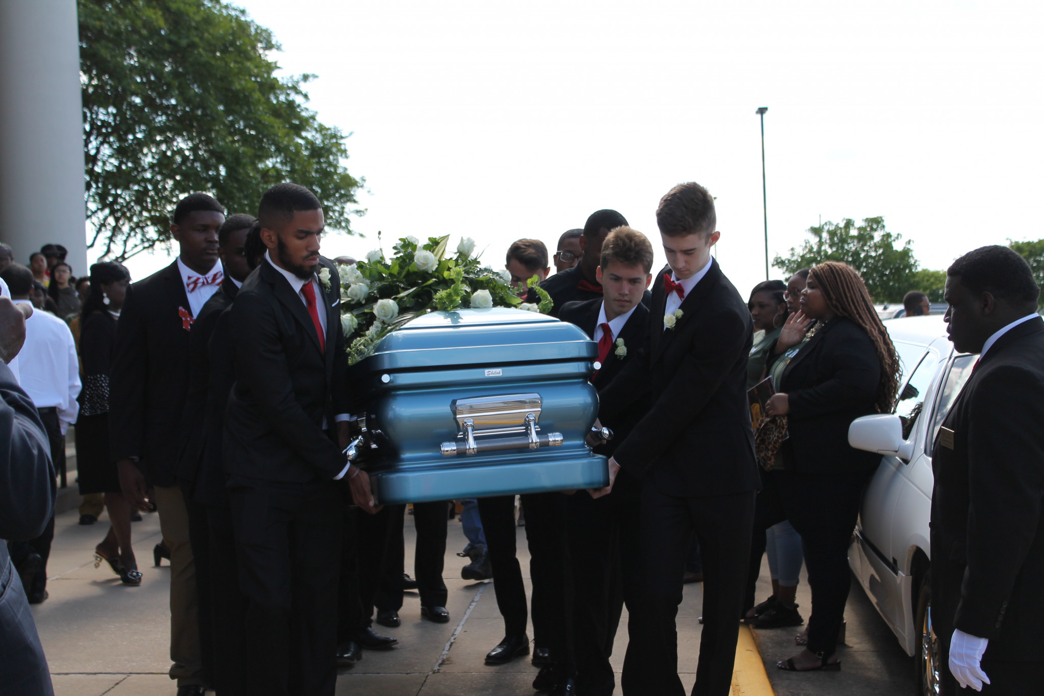 Ruston High School students bearing Remington Butler's casket